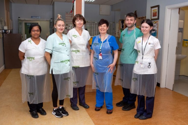 HaPPE apron on staff